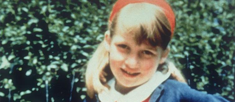 princess diana as an 8-year-old standing in front of a bush