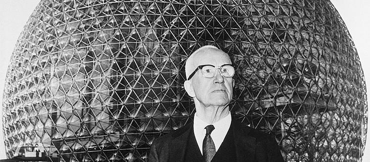 man standing in front of geodesic dome