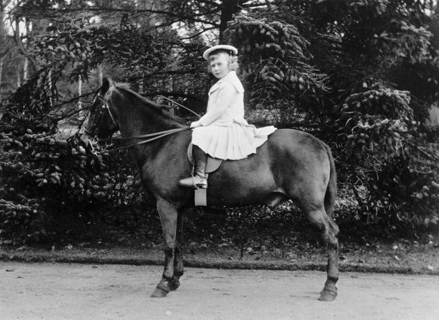 Prince George riding a horse