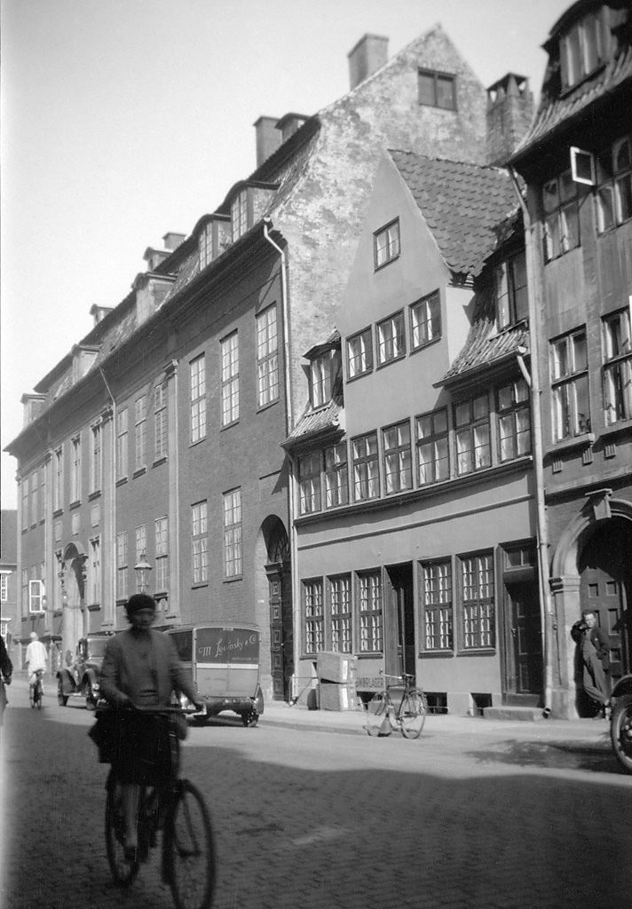 A cyclist in Ny Kongensgade (_New King Street_) in Copenhagen. The house in the middle is in 5, Ny Kongensgade