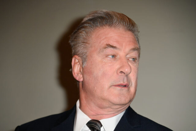 Alec Baldwin looking to the side