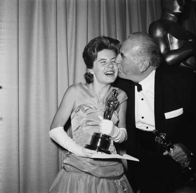 Ed Begley kissing Patty Duke on the cheek