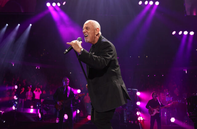 Billy Joel performing on stage