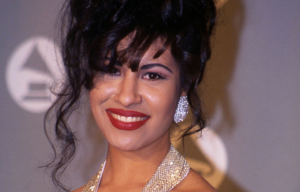 Selena smiling on the red carpet of the 36th Grammy Awards