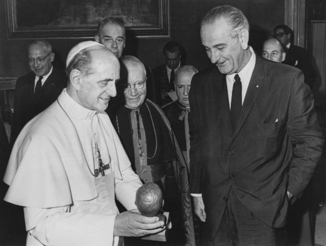 The Pope accepting a gift from LBJ