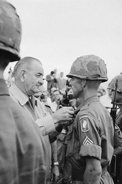 LBJ presenting an award