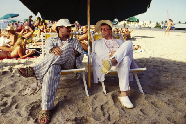 Robin Williams and Nathan Lane sitting in beach chairs in a scene from 'The Birdcage'