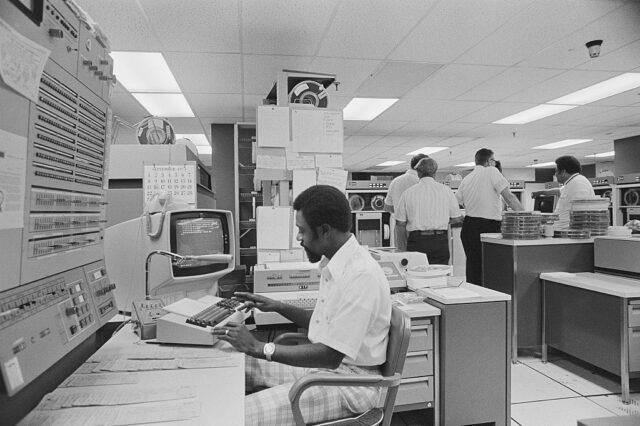 Men working in an office at the Department of Labor