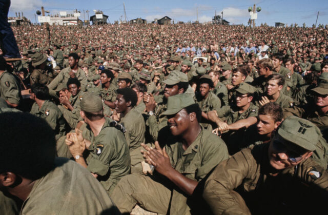 American soldiers sitting together outside