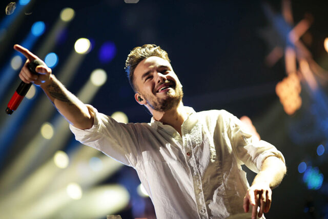 Liam Payne performing on stage