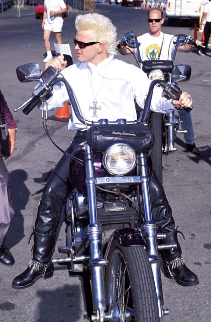 Billy Idol on a motorcycle.