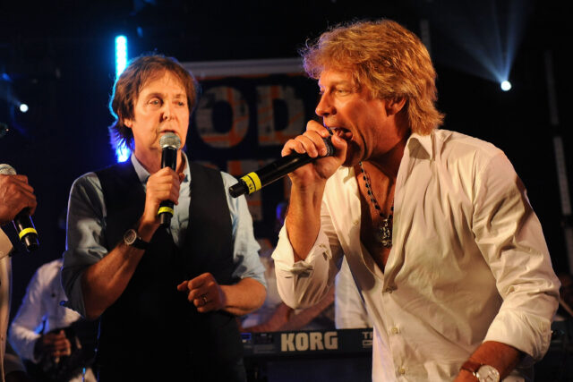 Paul McCartney and Jon Bon Jovi performing together.