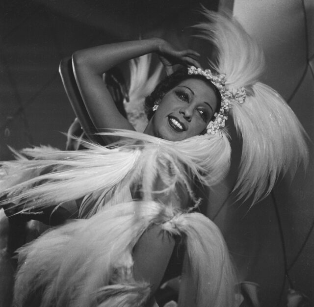 Josephine Baker with a feather boa.