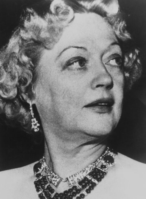 Headshot of Marion Davies looking to the left.