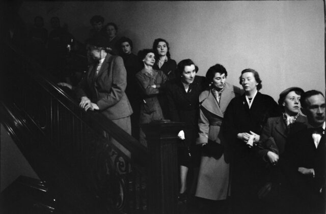 A large group of people crowded onto a staircase