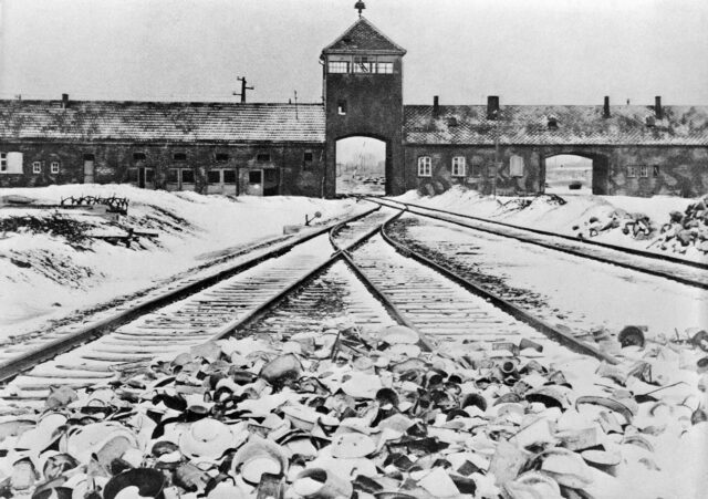 Snow-covered railway tracks leading into Auschwitz II-Birkenau