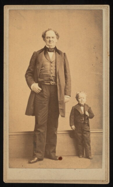 P.T. Barnum and Commodore Nutt standing side-by-side.