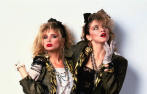 Rosanna Arquette and Madonna pose in 1980s fashion.