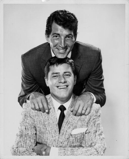 Dean Martin and Jerry Lewis posing together.