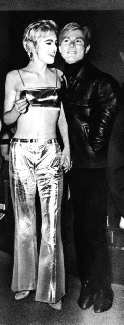 Edie Sedgwick and Andy Warhol standing together