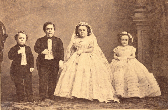 Commodore Nutt, Tom Thumb, Lavinia Warren, and Minnie Warren dressed for a wedding.