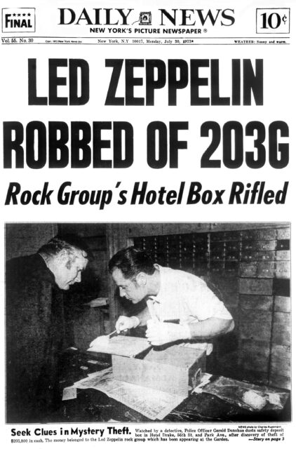 Newspaper headline that reads "LED ZEPPELIN ROBBED OF 203G"