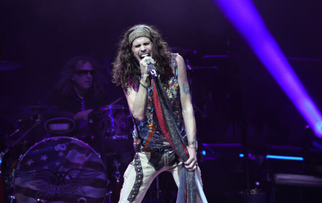 Steven Tyler performing on stage