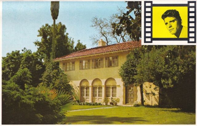 Postcard featuring an illustration of Burt Lancaster's mansion, with a portrait of him in the top right corner