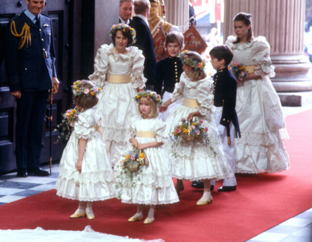 Bridesmaids and page boys standing at the entrance to St. Paul's Cathedral