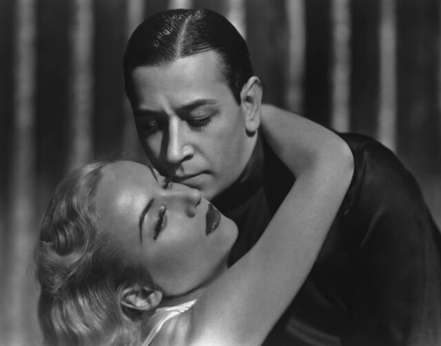 George Raft and Carole Lombard in an embrace.