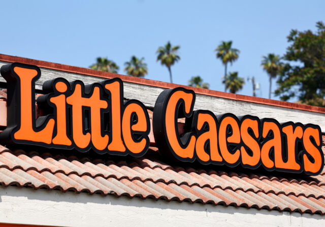 A Little Caesars restaurant sign.