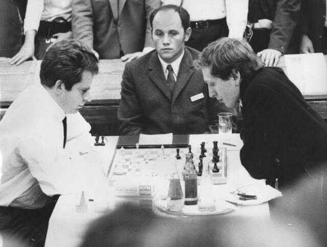 Boris Spassky and Bobby Fisher playing chess.