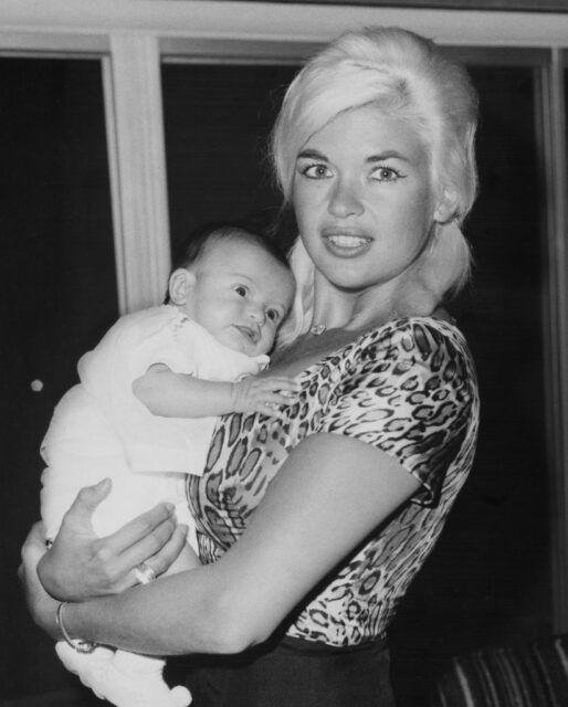 Jayne Mansfield holding an infant Mariska Hargitay