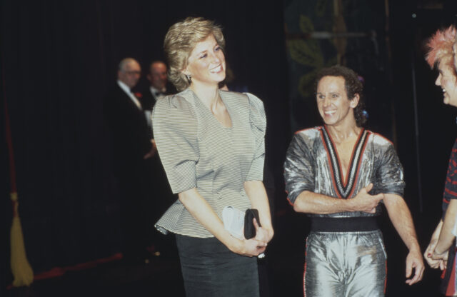 Princess Diana standing and smiling beside Wayne Sleep.