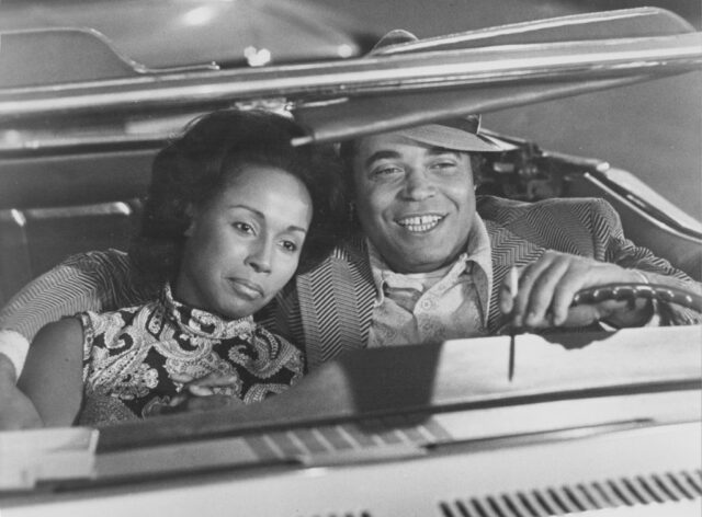 James Earl Jones and Diahann Carroll sitting in a car together.