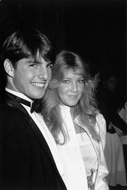 Tom Cruise and Heather Locklear standing together on a red carpet