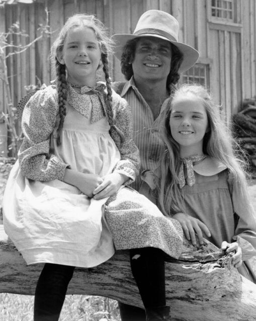 Michael Landon, Melissa Gilbert, and another cast member.