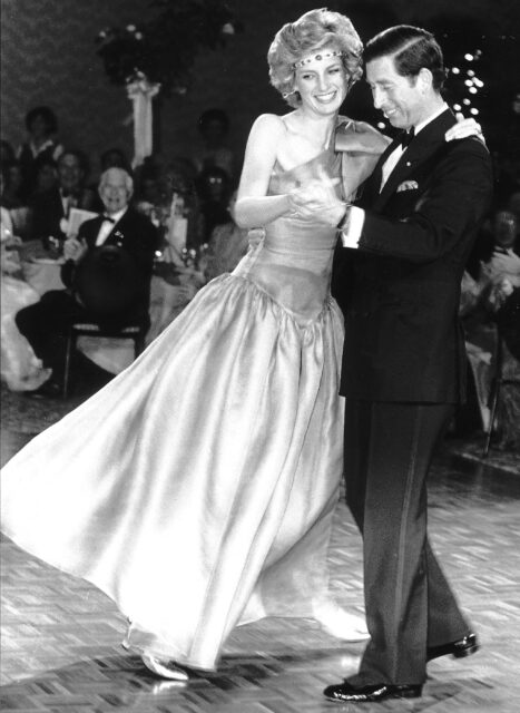 Princess Diana dancing with Prince Charles.