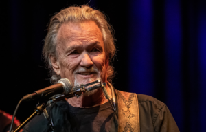 Kris Kristofferson performing on stage