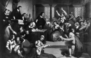 Illustration of people attending a Salem witch trial.