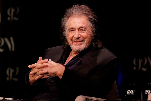 Al Pacino sitting on stage