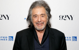 Al Pacino standing on a red carpet