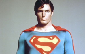 Headshot of Christopher Reeve in his Superman costume.