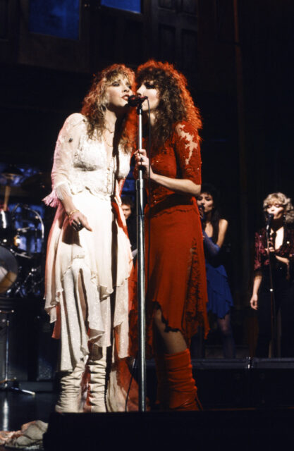 Stevie Nicks and Lori Perry performing together on stage