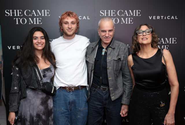 Ronan Day-Lewis, Daniel Day-Lewis, Rebecca Miller and an unidentified woman standing on a red carpet