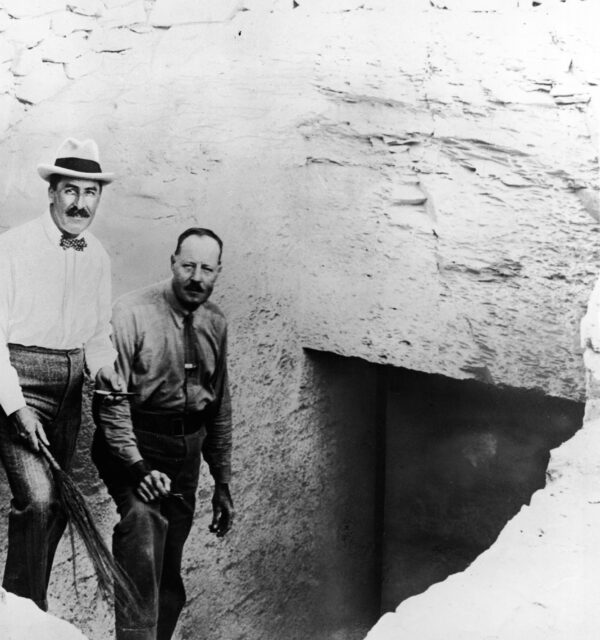 Howard Carter and Arthur Callender standing at the entrance to Tutankhamun's tomb.