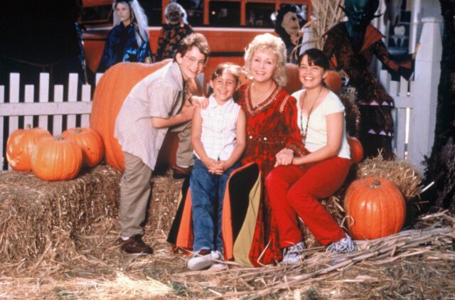 Joey Zimmerman, Emily Roeske, Debbie Reynolds and Kimberly J. Brown sitting together on the set of 'Halloweentown'