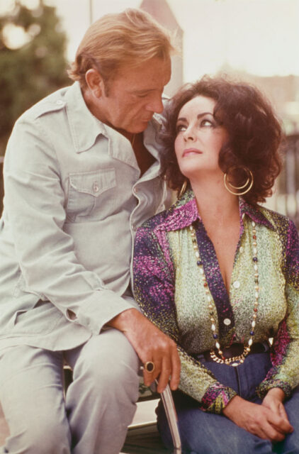 Richard Burton and Elizabeth Taylor sitting together