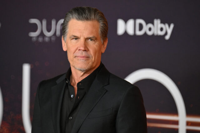 Josh Brolin standing on a red carpet