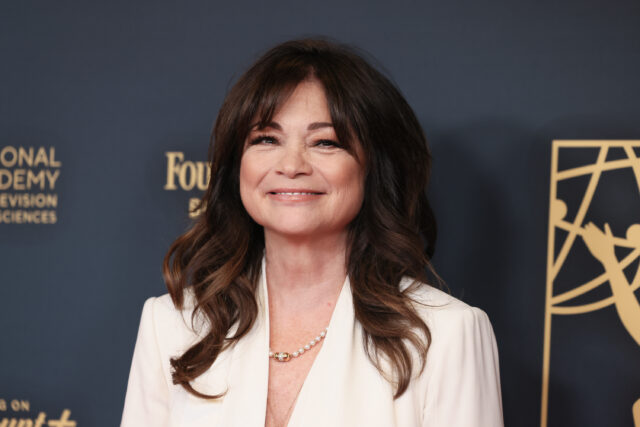 Valerie Bertinelli standing on a red carpet